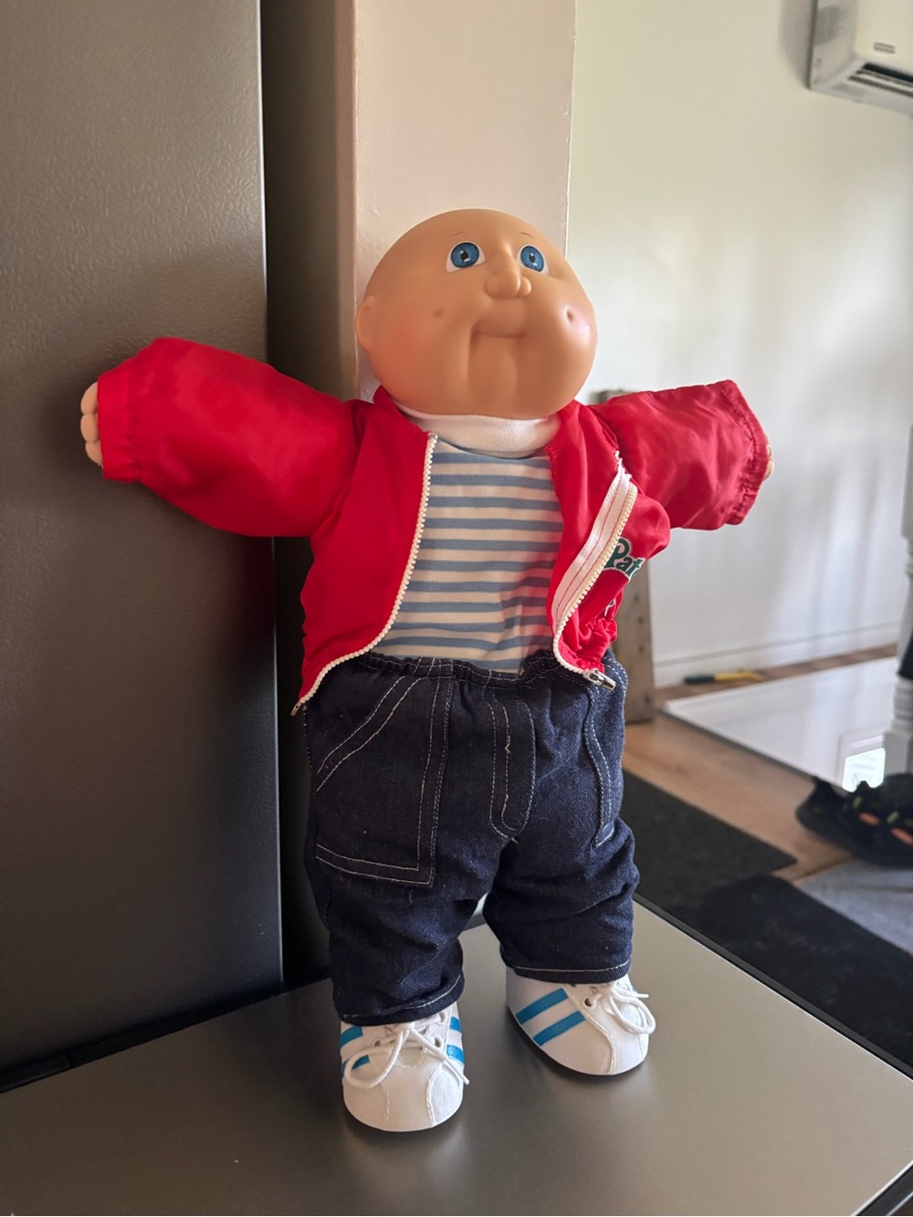 Classic Baby Doll in Red Jacket and Blue Striped Outfit - Kids Toy